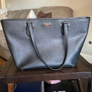 Kate Spade purse, black, with zipper pocket in back and 2 pockets in front.